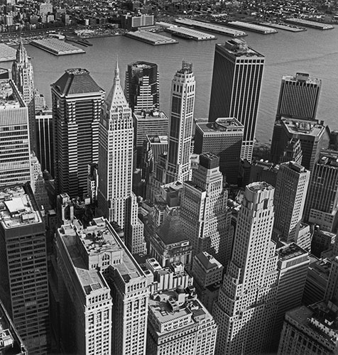 Aerial view of the Wall Street area, 2000. Lower left: Equitable Building, 1915. Architect: Graham, Burnham & Company.Near center: 40 Wall Street, Bank of Manhattan Company Building, 1930.Architect: H. Craig Severance and Yasuo Matsui.