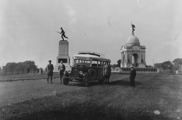 Buses allowed preservationists to maintain control of the field while still affording access to a maximum number of visitors. This image from the 1920s shows how large buses could easily manage the carefully designed roads around the Pennsylvania State Memorial (center right), which commemorates the 34,530 Pennsylvania soldiers who fought at Gettysburg. Completed in 1914, at 110 feet it remains the largest monument on the battlefield. The 72nd Pennsylvania Infantry Monument (center left) was dedicated on July 4, 1891, to honor the regiment that held back Confederate forces engaged in the Pickett-Pettigrew-Trimble assault at the Angle. Photographer unknown. Source: Gettysburg National Military Park Archives.