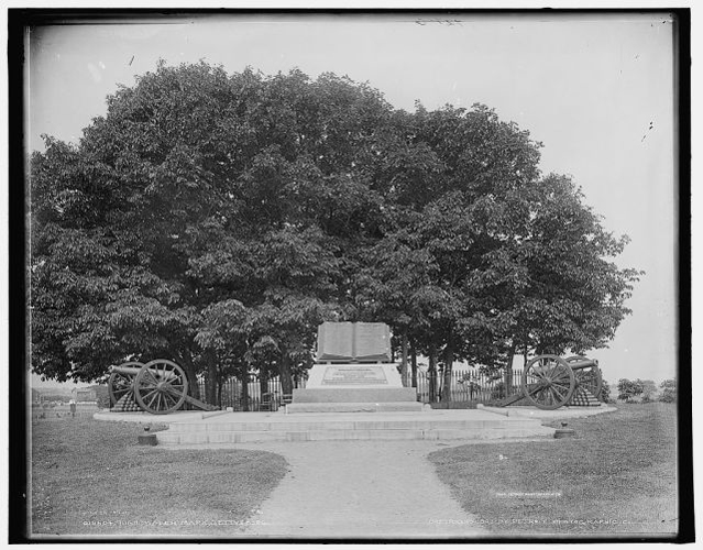 Since 1900, the commemorative Copse has been set aside with an iron fence. After interviewing Confederate veterans, John D. Bachelder decided that this group of trees was the goal of the Confederate surge on July 3, known as the High-Water Mark. In hopes of encouraging more Confederate participation at Gettysburg, he led the Gettysburg Battlefield Memorial Association to set the Copse aside from all other portions of the battlefield. Photographer unknown, 1903. Source: Gettysburg National Military Park Archives.