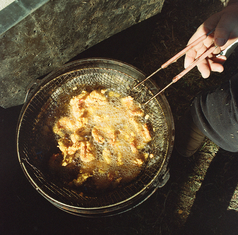 Cooking soft-shell shrimp in Yscloskey, 2015.