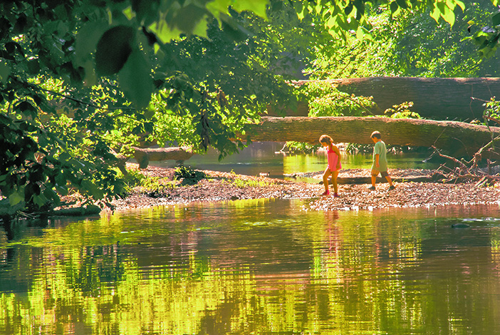 Children at play in Rock Creek. (© Susan Austin Roth)