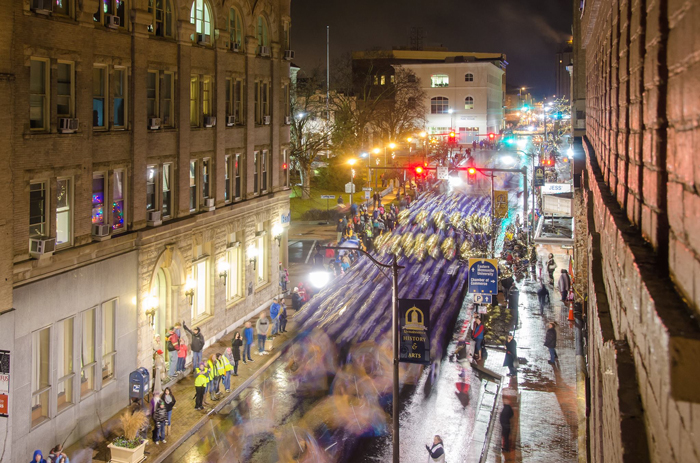 Bird’s-eye photograph (2014) by Art Pekum of a holiday parade on Main Street near Court Square. With the growing success of revitalization efforts, more residents and visitors are returning downtown.