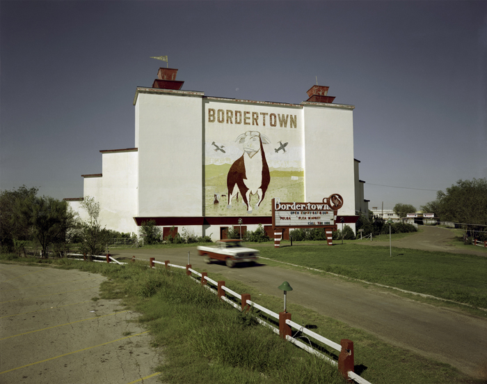 November 3, 1985. The Bordertown Drive-in Theater pictured at right, was on U.S. 59 in Laredo, Texas, a few miles from the Mexican border. It had a mural very similar to that of the Bordertown Drive-in Theater, which was on U.S. 62 and 180, a few miles from the Mexican border in El Paso, Texas. Laredo Air Force Base was nearby and Fort Bliss was near the Bordertown in El Paso, which might explain the twin jets bracketing the bull.