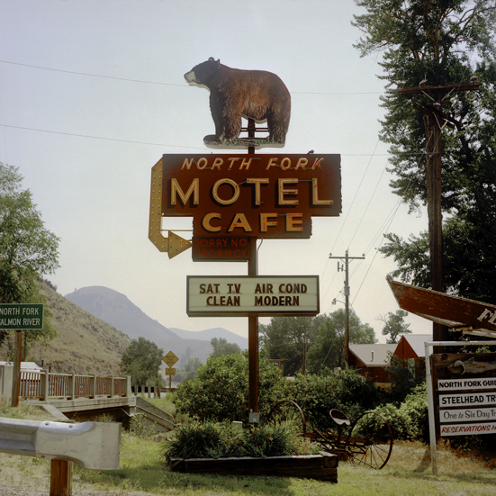 July 19. 2007. The North Fork Motel is on U.S. 93 in the town of North Fork, Idaho, next to the North Fork of the Salmon River. Lewis and Clark passed this spot on their way west in 1805, after crossing Lemhi Pass and before going over the Lost Trail Pass about thirty miles to the north. This is a 1940s style, pre-franchise sign with a name and design that relate to the local area in Idaho.