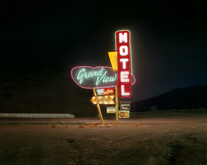 December 18, 1980. The Grand View Motel is on the very north end of Raton, New Mexico,on U.S. 87; the Capri Motel is nearby. Both motels are close to the old Santa Fe Trail on the southern side of Raton Pass. The star above the Capri is on Goat Hill, which is lit up around Christmas, is surrounded on three sides by the town of Raton.