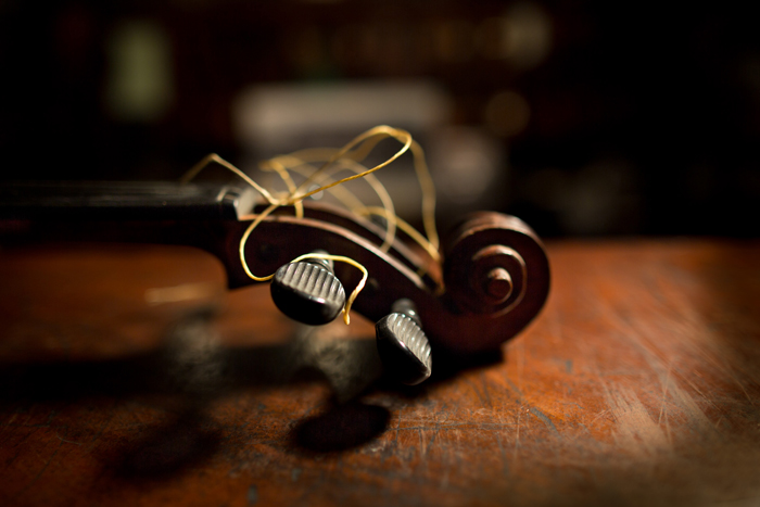 An unrestored unplayable violin that had been used by a Jewish street musician during the Holocaust.