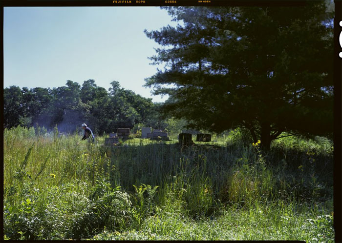 Mr. Stiff takes care of his family's plot.  (© Stephen Longmire)