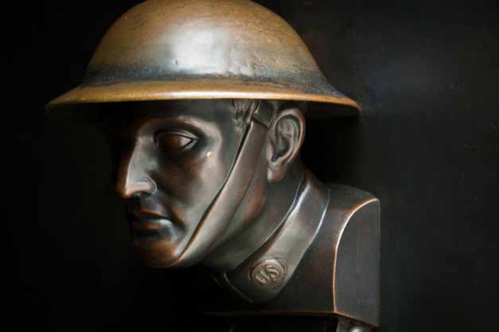 The chapel at Saint-Mihiel Cemetery in Thiaucourt, France, has two massive, swinging bronze doors whose doorknobs are the heads of American doughboys.