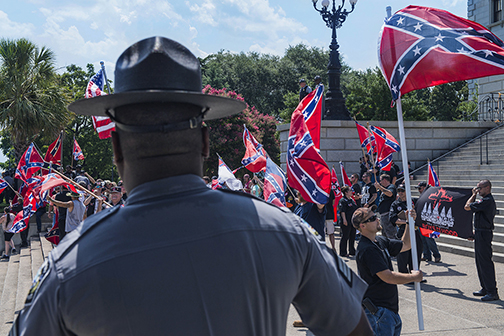 A KKK rally in support of the Confederate battle flag, one week after its removal from the State Capitol grounds, Columbia, SC (2015).