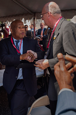 Congressman John Lewis (left) and fellow Freedom-Fighter survivor, James Zwerg, at the Fiftieth Anniversary celebration of the Greyhound bus-station assault, Montgomery, AL (2011).