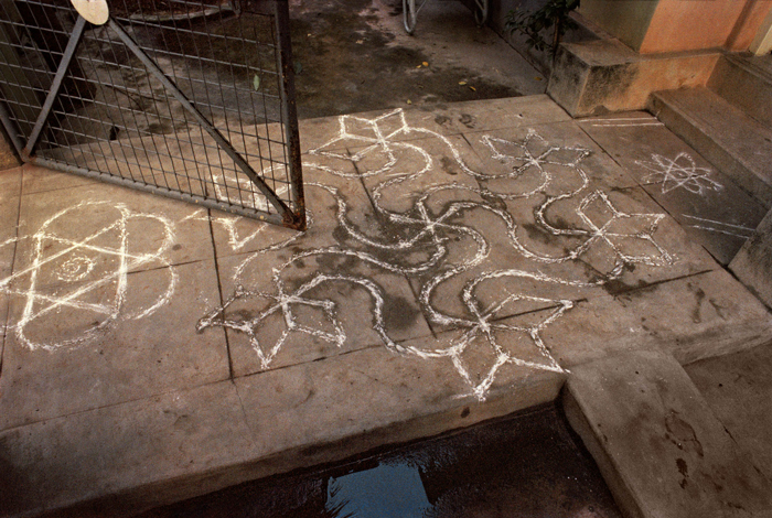 Cosmic diagram, Anandhi’s threshold on Vinayagam Street, R. A. Puram, Chennai, 1986.