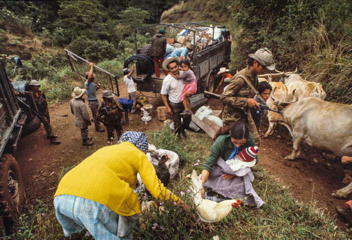 Sandinista Popular Army troops uproot peasant families in the deep countryside to create a “free-fire zone” to battle the U.S.-backed Contra rebels, El Ventarrón, Jinotega Department, Nicaragua, February 1985.
