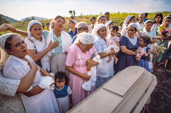 Evangelical mourners wail at the funeral for relatives in the government’s local Civil Defense force killed in a rebel attack, Santa Cruz Loma, La Paz Department, El Salvador, April 1985.