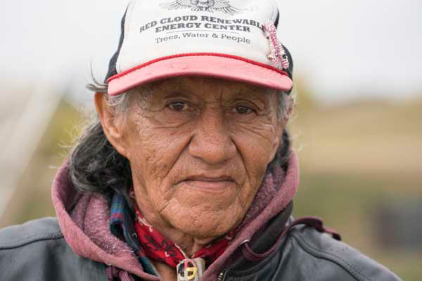 A volunteer Lakota Water Protector who installed solar power in camp.