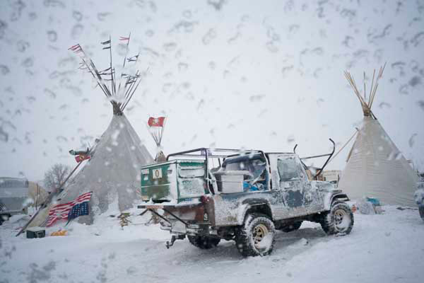 The first blizzard hits camp.