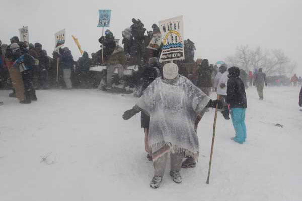 Native and non-native U.S. military veterans protest the brutal police action at Backwater Bridge.