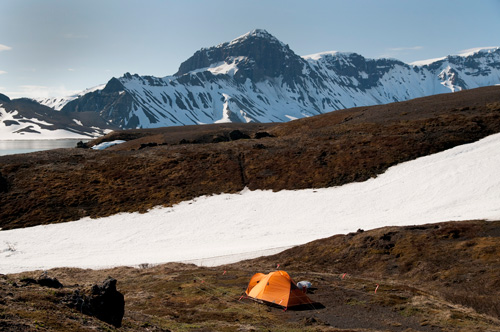 Campsite with a bear fence, looking toward Black Nose, Aniakchak volcano, AK