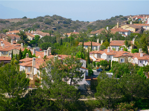 Red tile roofs mark a nearby suburb