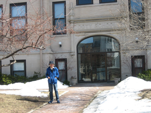 Yi-Fu in front of Doty School