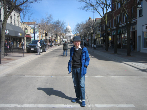 Yi-Fu standing in middle of State Street